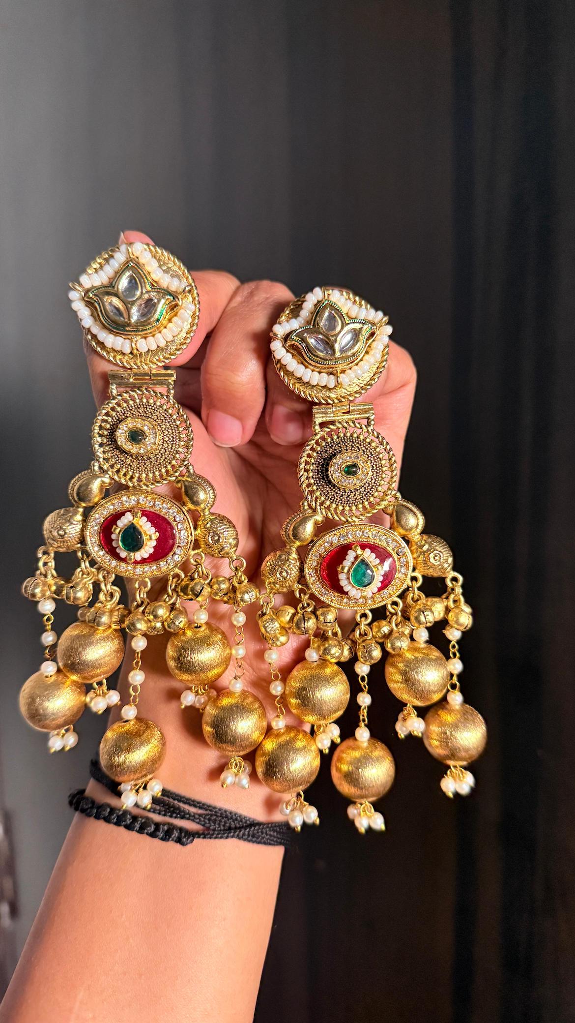 Suman earrings - red image 0